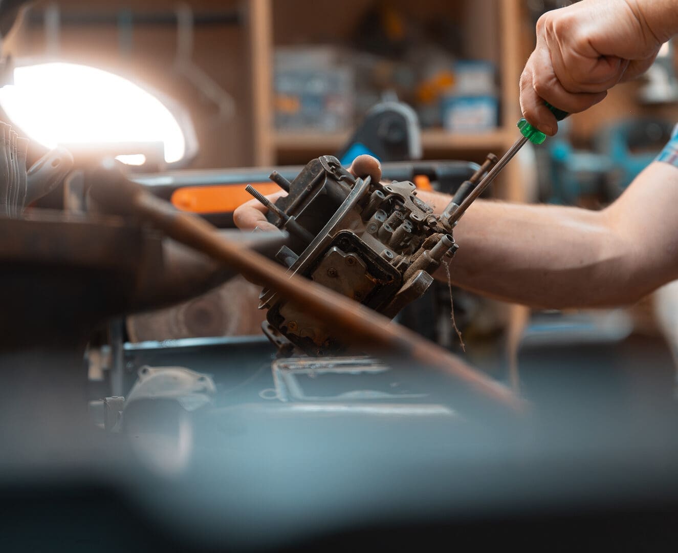 Mitch-38 working on restoring a vintage car